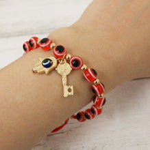 Load image into Gallery viewer, Red String Evil Eye St. Benedict Key Bracelet